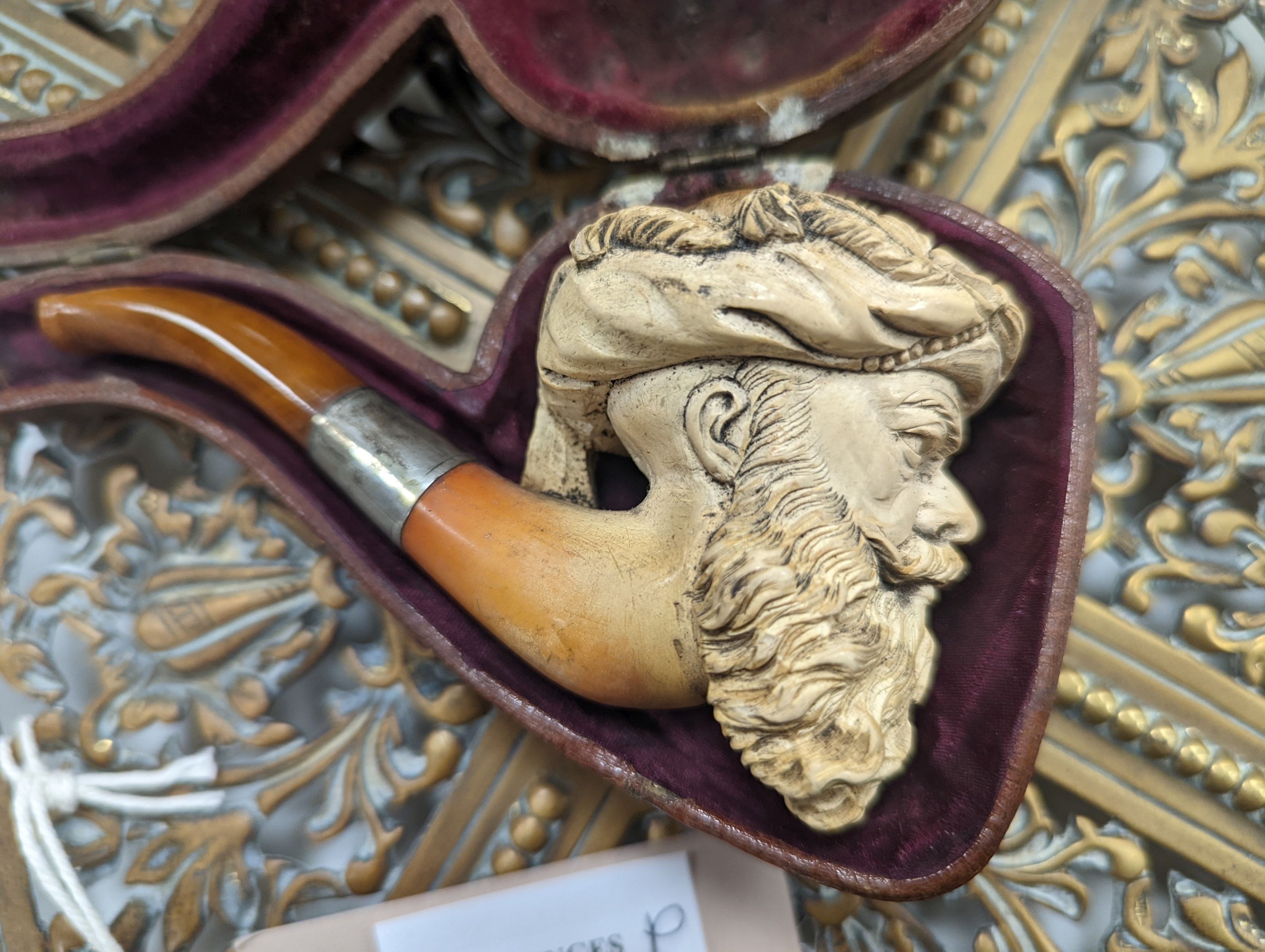 A Meerschaum pipe, a copper casket and brass stand